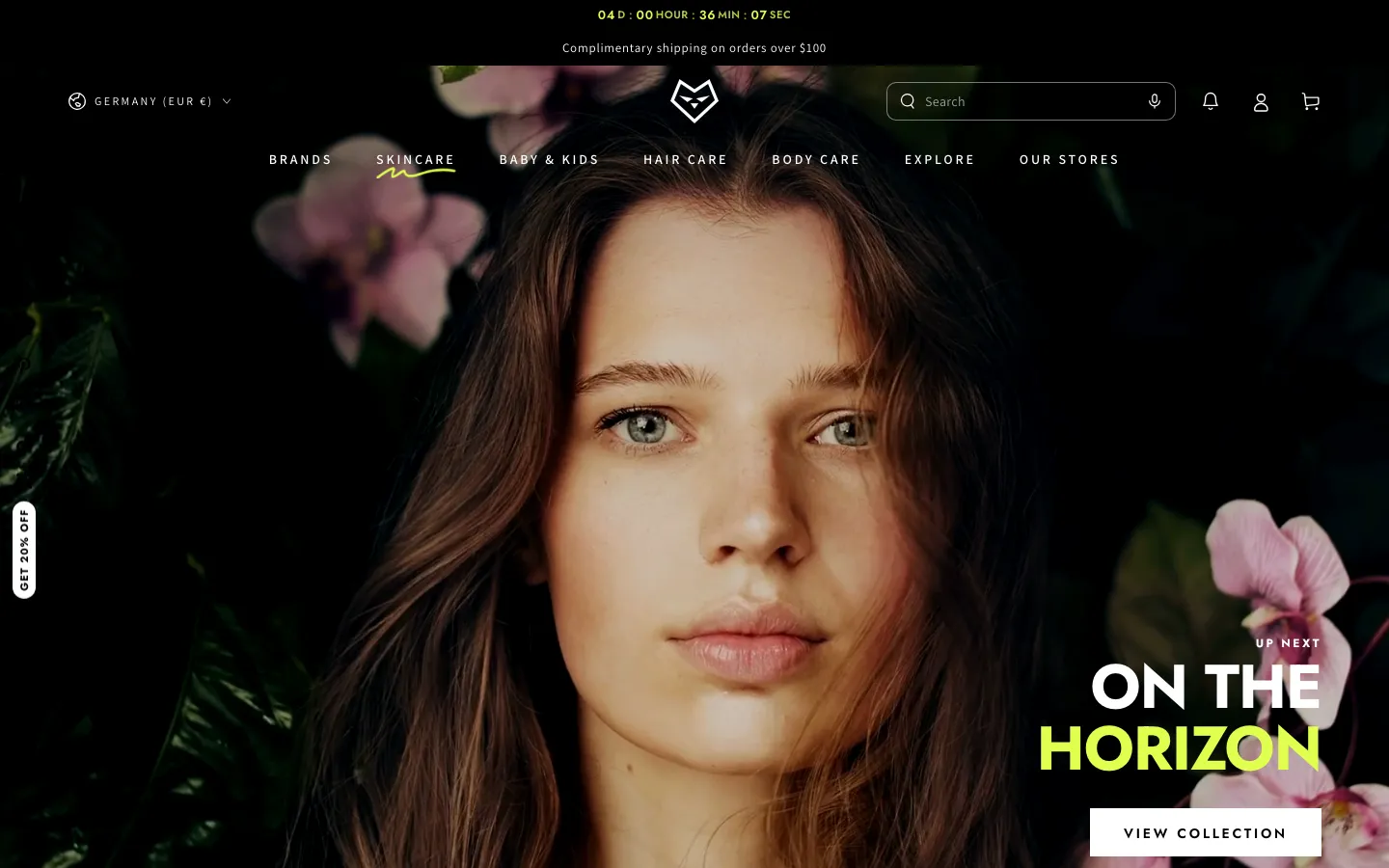 Be Yours demo store home page with a close-up of a model among pink orchids and an "On the horizon" headline